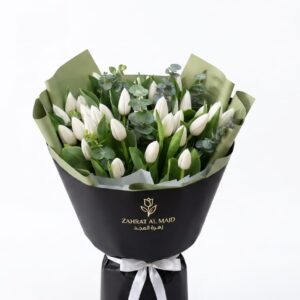 White tulips bouquet with eucalyptus