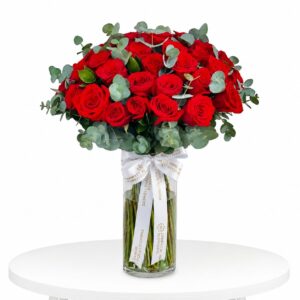 50pcs red roses with eucalyptus inside the vase