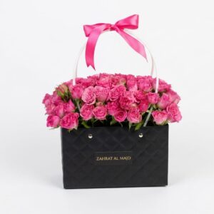 Dark pink spray roses inside the bag
