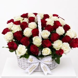 Red and white 101 roses inside the basket